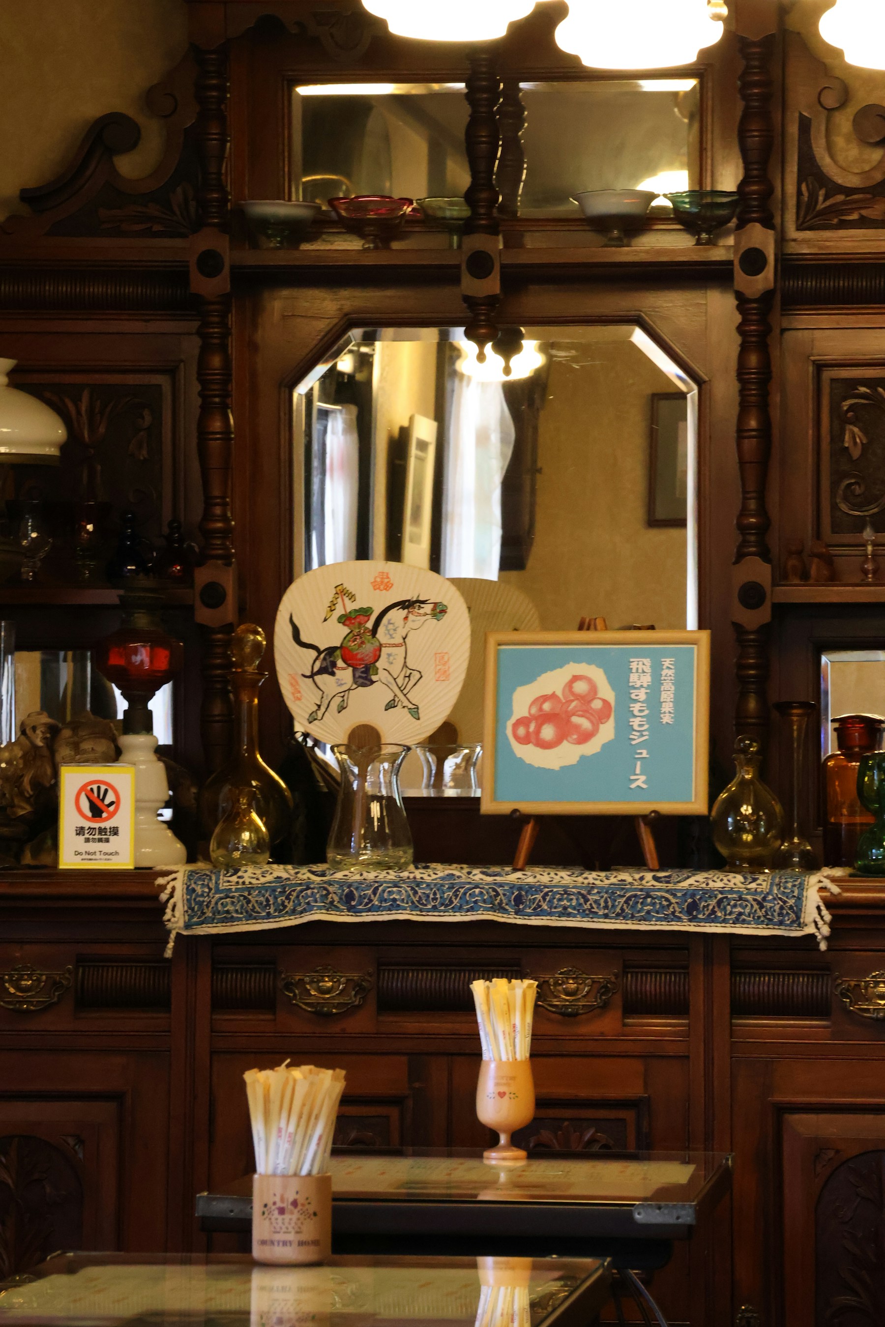 Ornate dark wooden cabinet in a traditional Takayama interior
